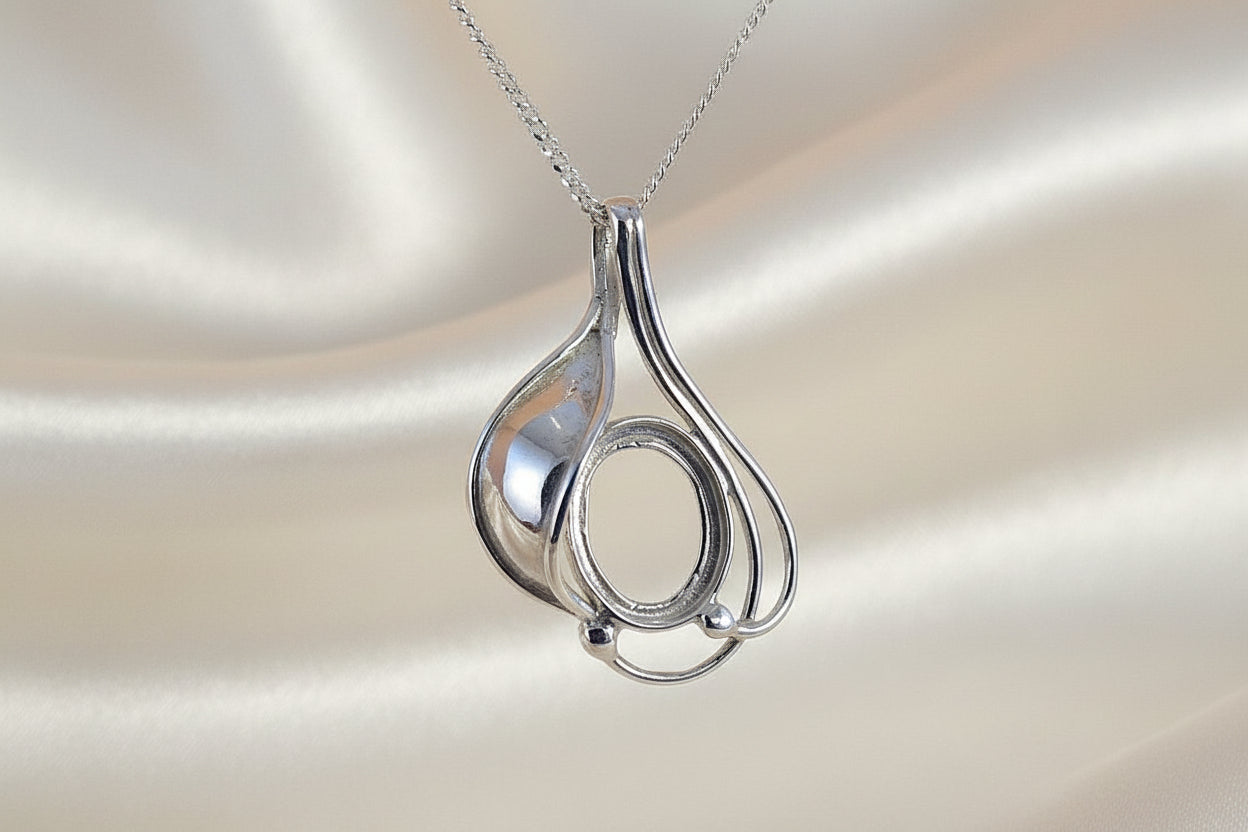 Silver Pendant Unset For A 10x8 Cabochon Gemstone