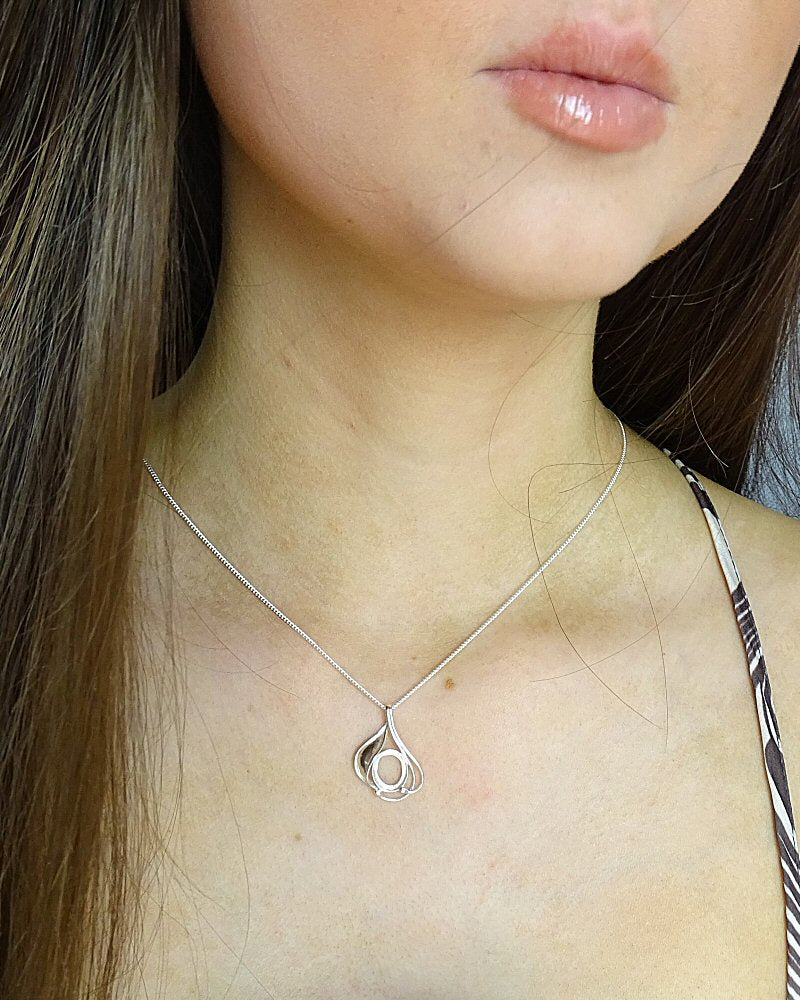 Silver Pendant Unset For A 10x8 Cabochon Gemstone