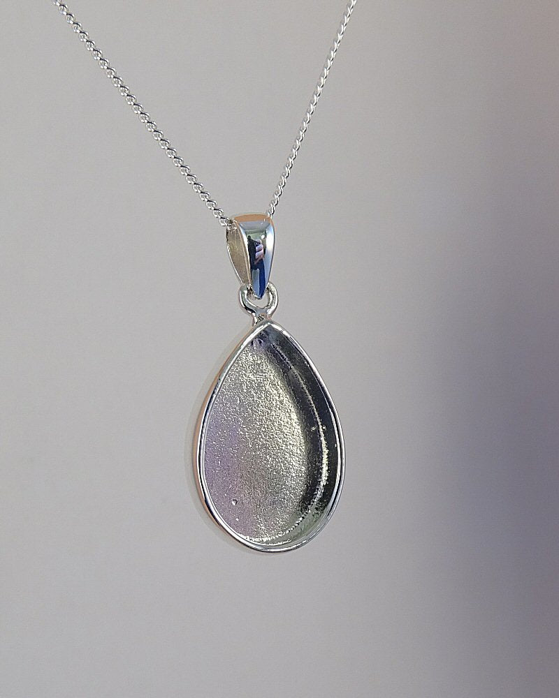 silver solid back teardrop pendant