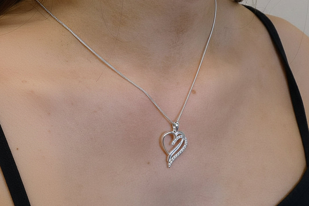 Stunning silver double heart memorial setting