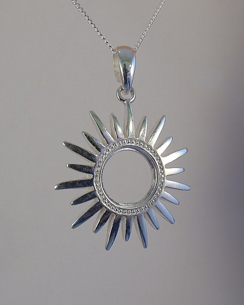 silver sun pendant for stone