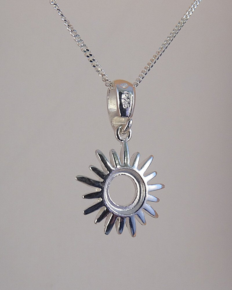 sunburst silver pendant blank