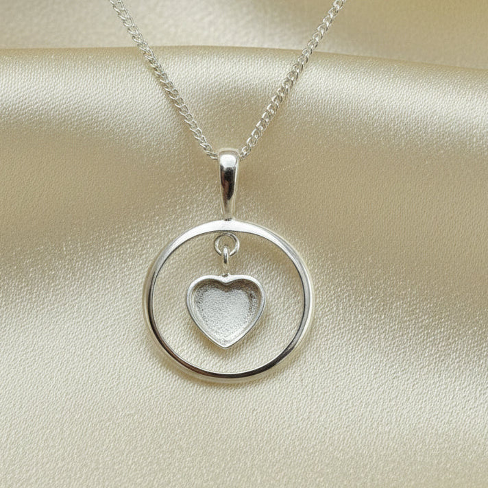 Solid silver pendant with heart shaped setting area for resin