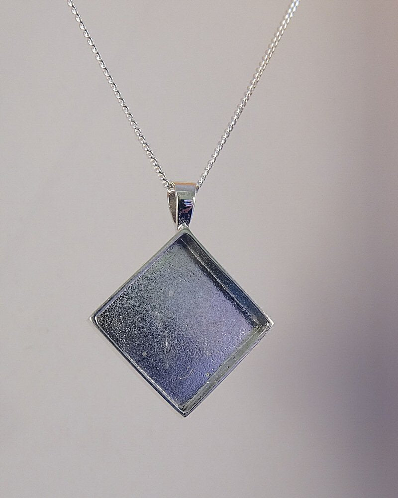 Silver square solid back pendant