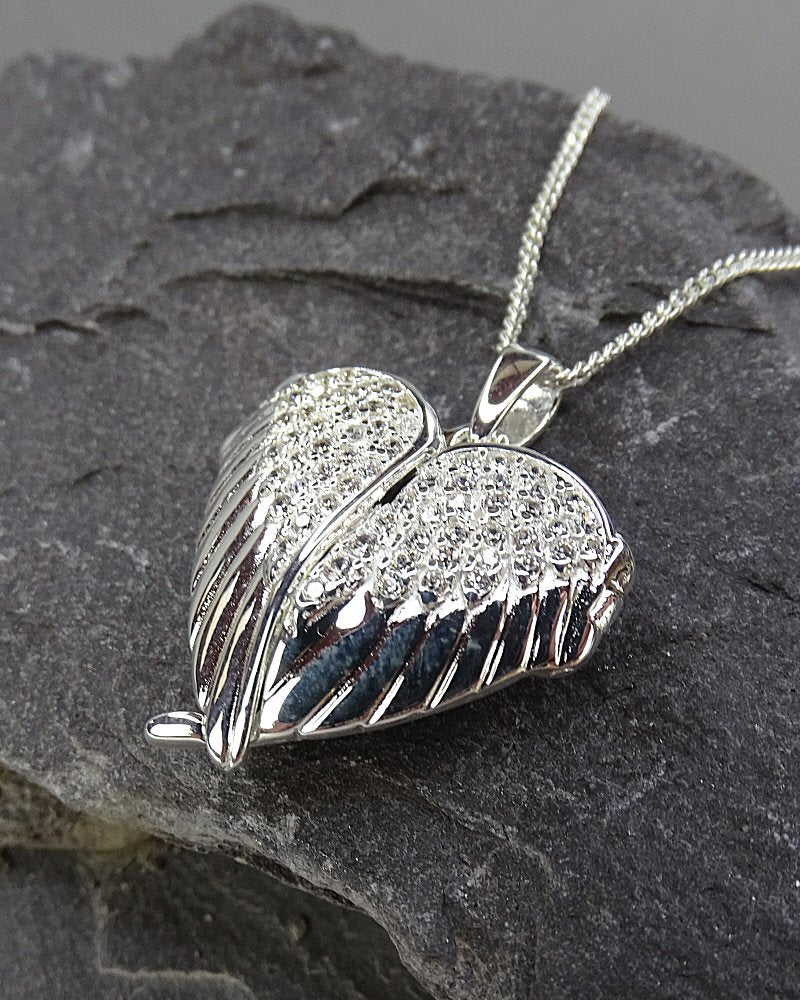 Solid Silver Winged Heart Locket With CZ Stones