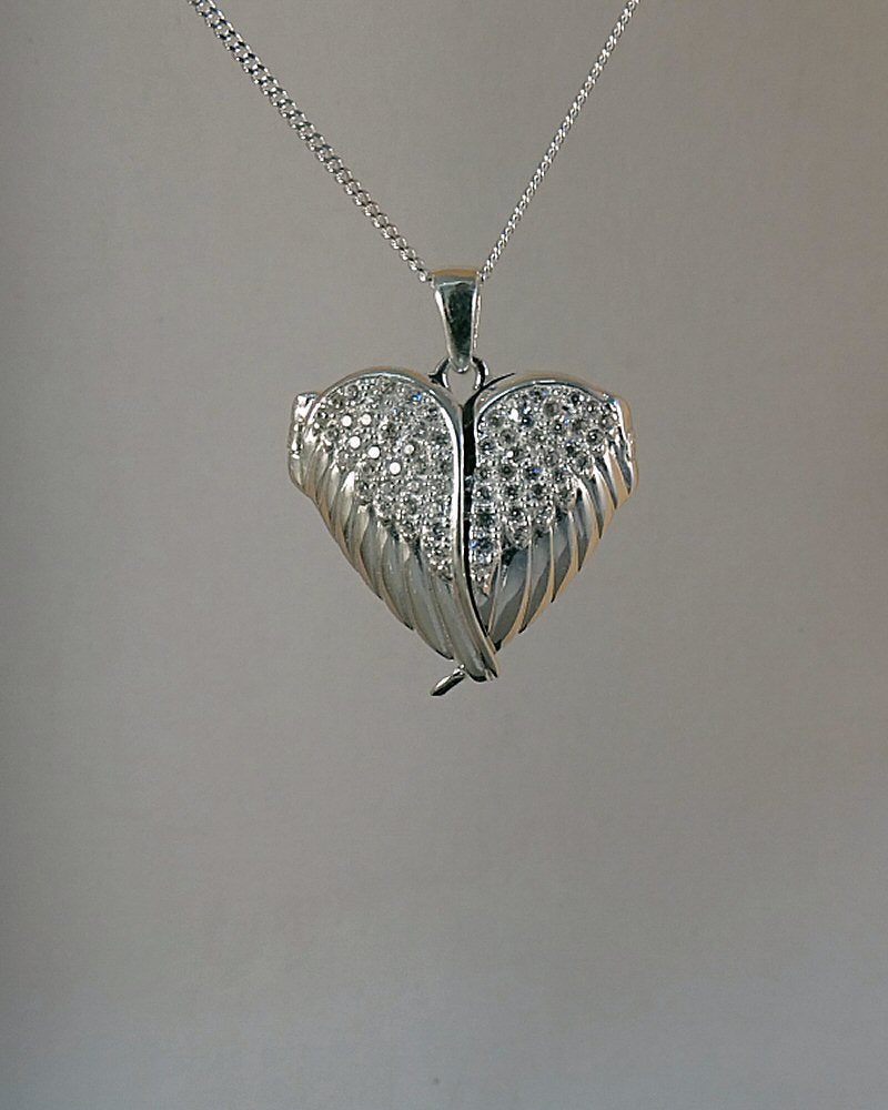 Solid Silver Winged Heart Locket With CZ Stones