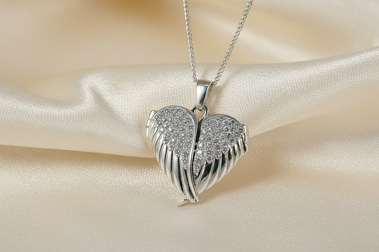 Solid Silver Winged Heart Locket With CZ Stones
