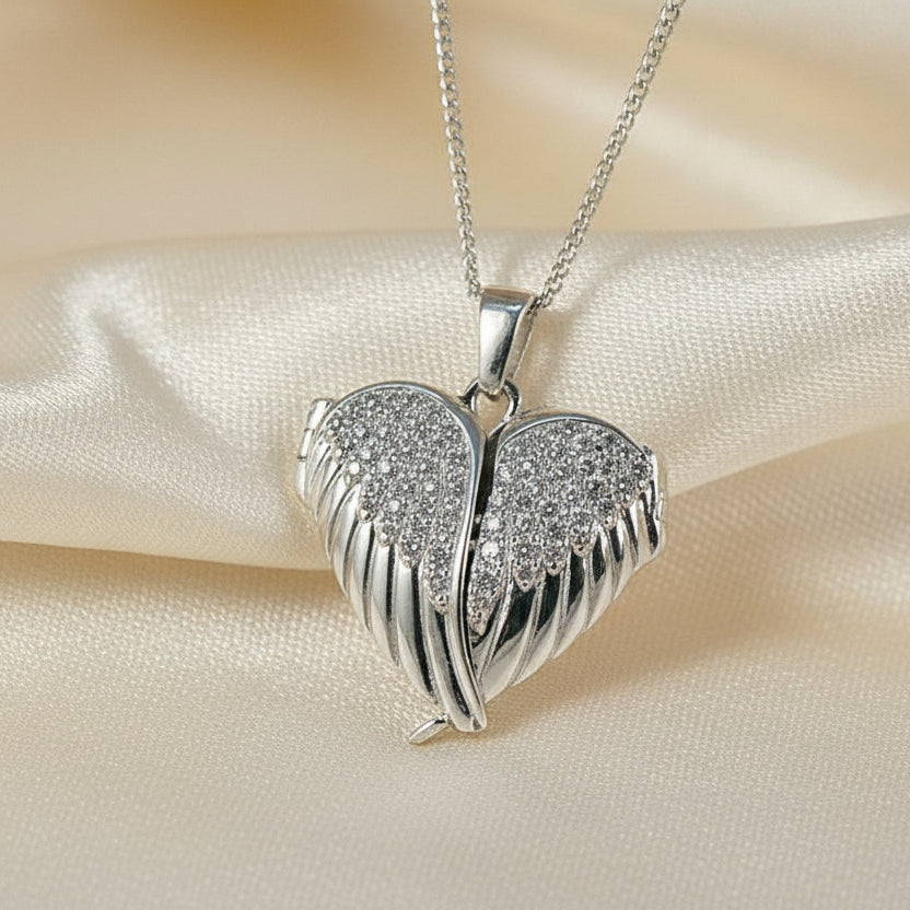 Solid Silver Winged Heart Locket With CZ Stones