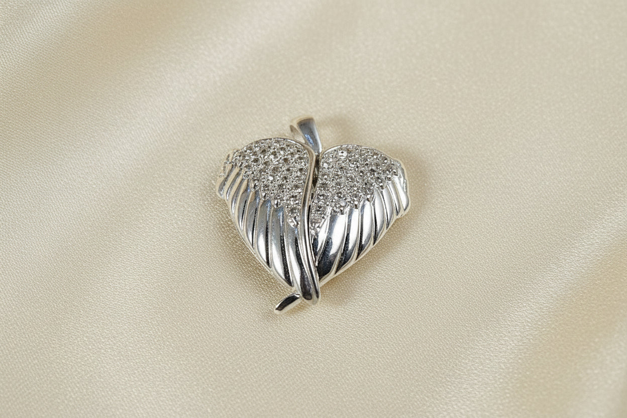 Solid Silver Winged Heart Locket With CZ Stones