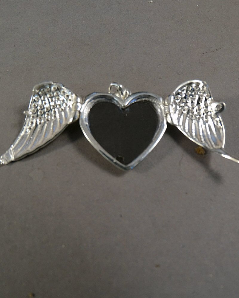 Solid Silver Winged Heart Locket With CZ Stones