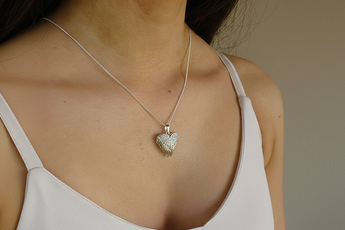 Solid Silver Winged Heart Locket With CZ Stones