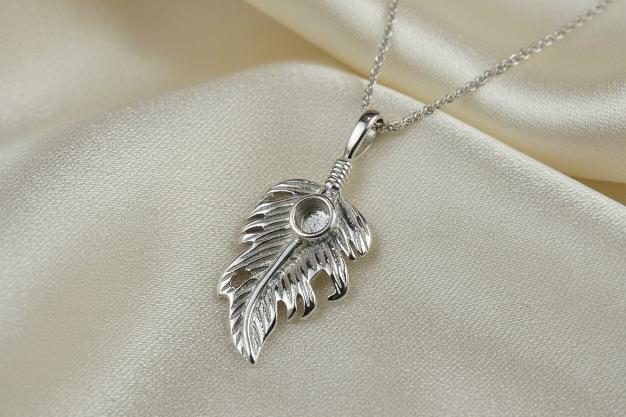 Silver feather style pendant to fit a 4mm cabochon or Resin