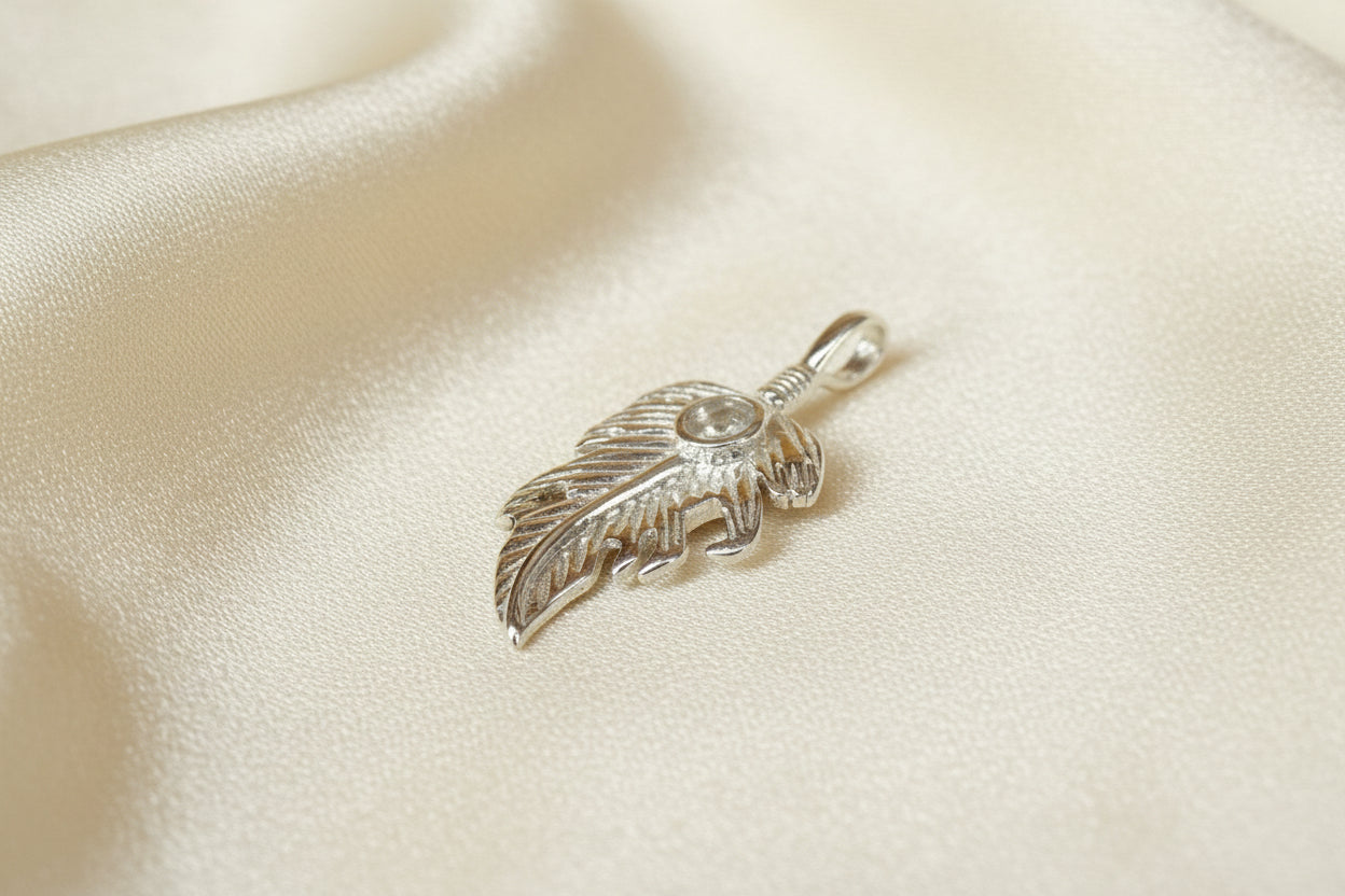 Silver feather style pendant to fit a 4mm cabochon or Resin
