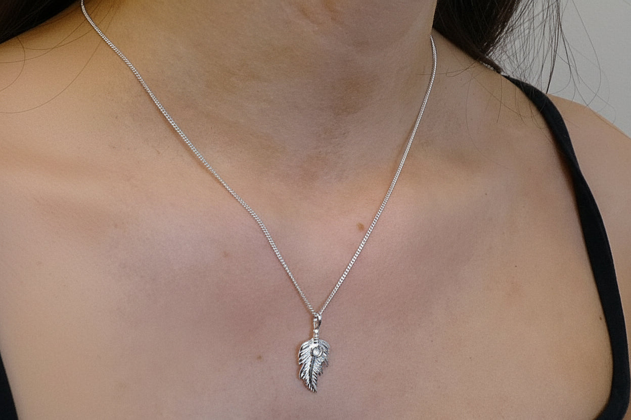 Silver feather style pendant to fit a 4mm cabochon or Resin