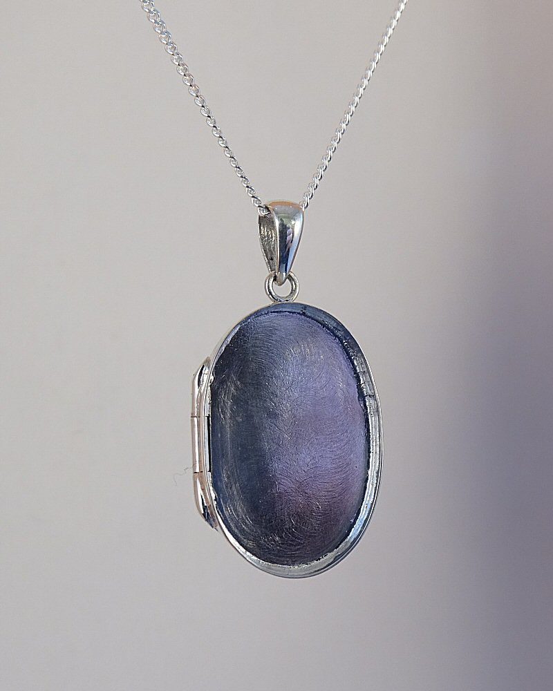 unset silver locket