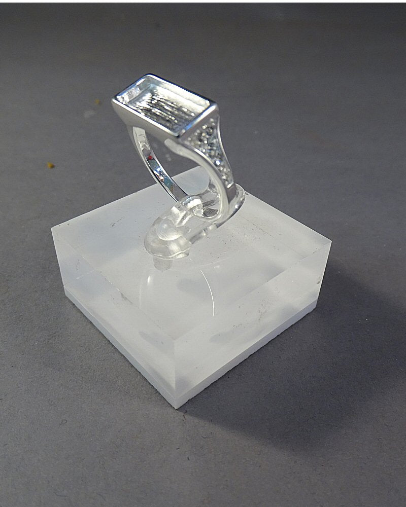 Solid silver Ring with oblong setting area with cz stones