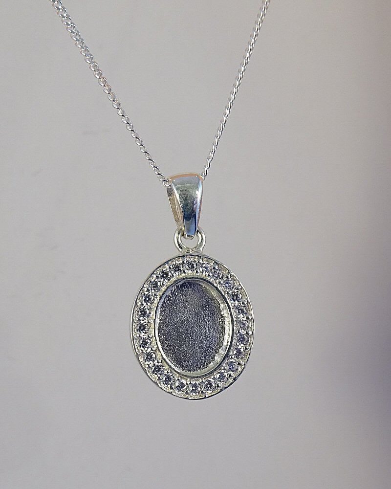 silver pendant with cz surround for 10x8 stone