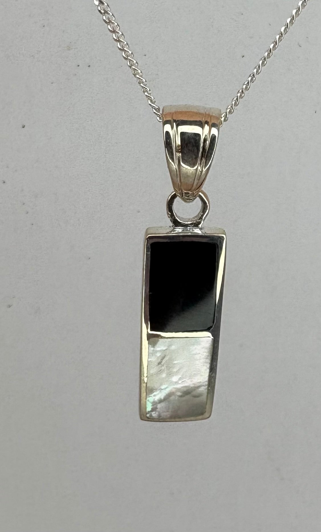 silver black onyx and mop pendant