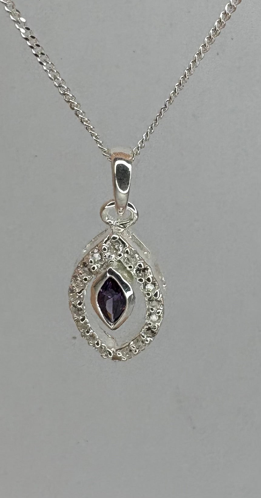 SILVER MARQUISE SHAPE PENDANT WITH CZ AND AMETYST TYPE STONE