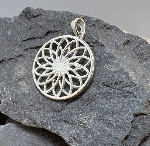 ROUND SILVER FANCY PENDANT