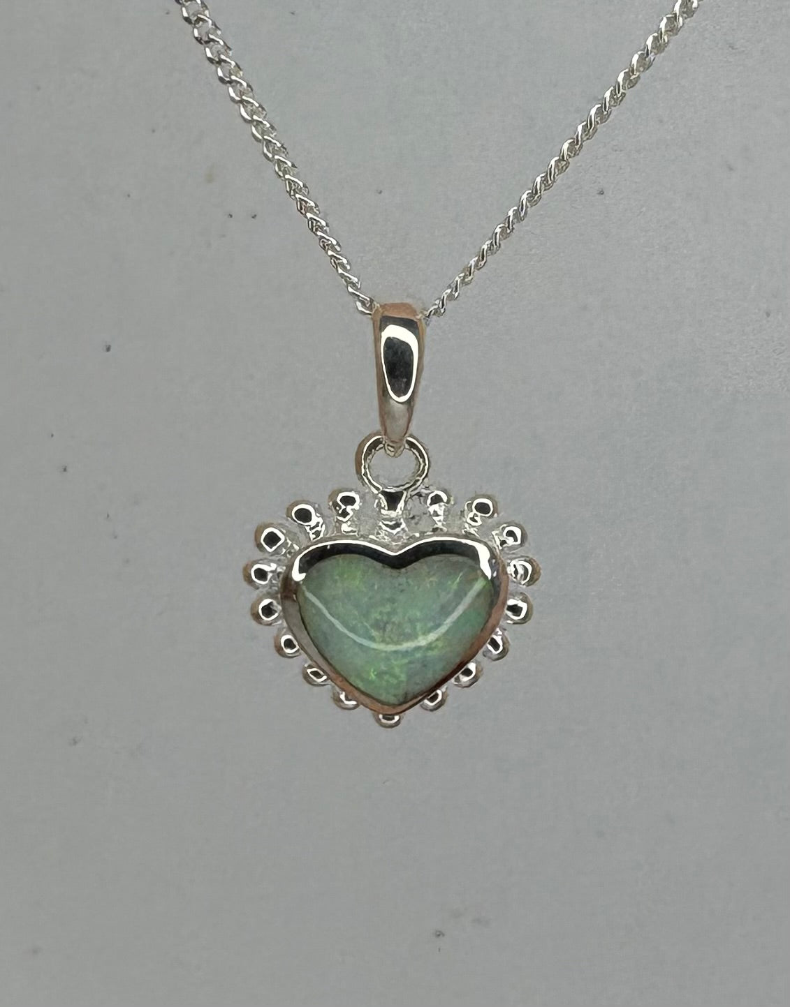 SILVER HEART PENDANT WITH OPAL TYPE STONE