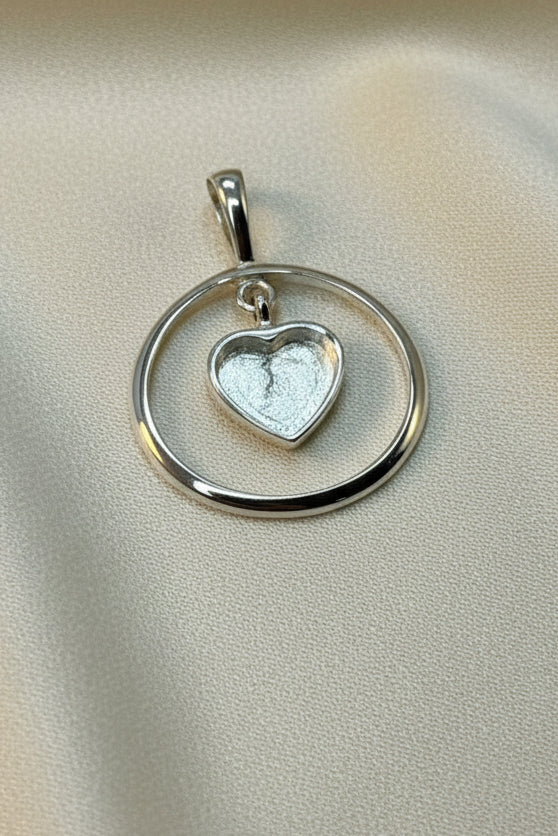 Solid silver pendant with heart shaped setting area for resin