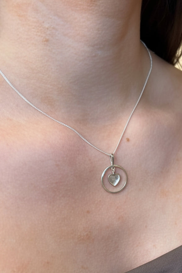 Solid silver pendant with heart shaped setting area for resin