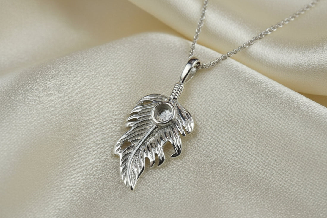 Silver feather style pendant to fit a 4mm cabochon or Resin
