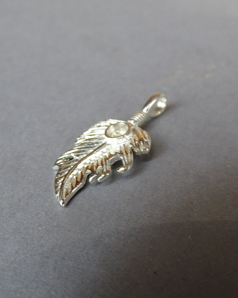 Silver feather style pendant to fit a 4mm cabochon or Resin