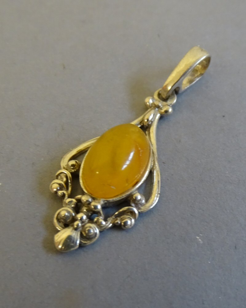 SOLID SILVER PENDANT WITH AMBER CABOCHON